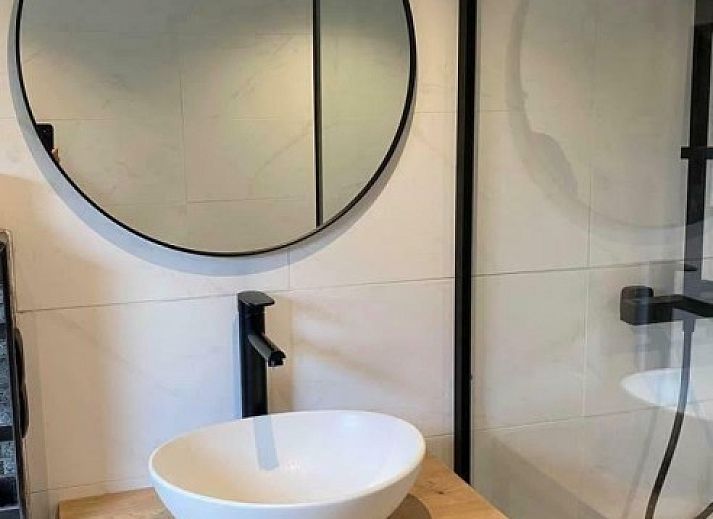 Cozy porch of Cottage 54 in Wateren, Southwest Drenthe, perfect for relaxing outdoor seating.