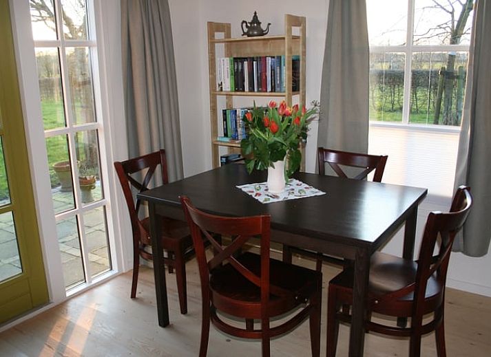Cozy living room in Holiday cottage in Wittelte, Southwest Drenthe. Comfortable sitting area overlooking the garden.