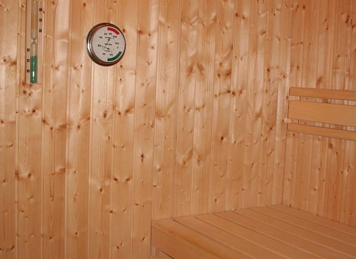 Cozy living room in Holiday cottage in Wittelte, Southwest Drenthe. Comfortable sitting area overlooking the garden.