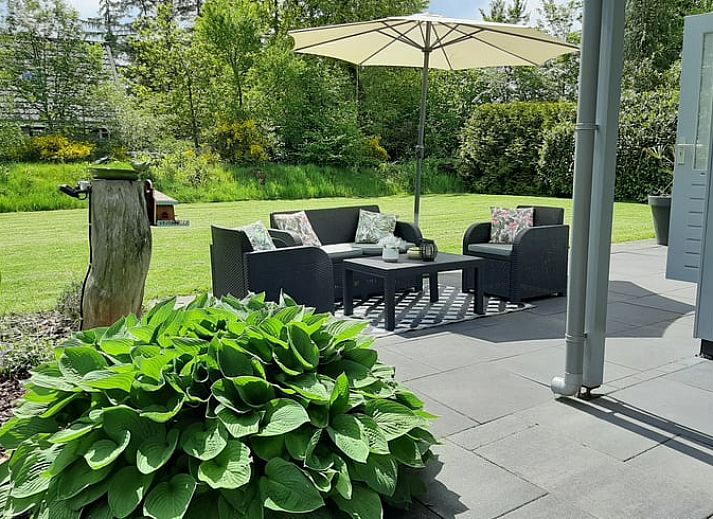 Cozy sitting area in Holiday Home in Wittelte, perfect for a relaxing stay in Drenthe.