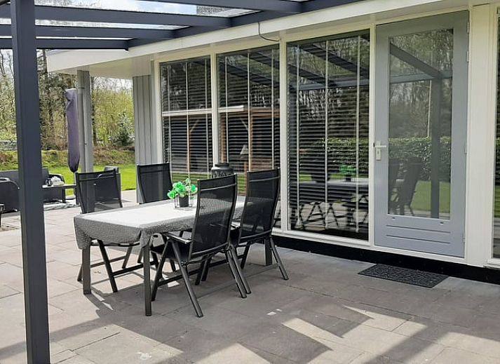 Cozy sitting area in Holiday Home in Wittelte, perfect for a relaxing stay in Drenthe.