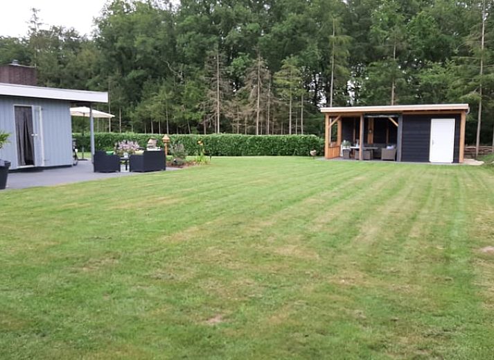 Cozy sitting area in Holiday Home in Wittelte, perfect for a relaxing stay in Drenthe.