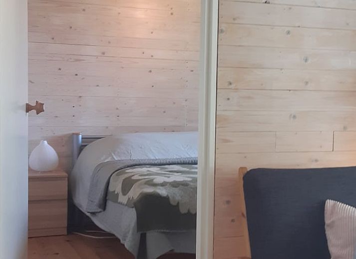 Blossom in full bloom at Cottage in Koekange, vacation home in southwest Drenthe, with veranda in the background.