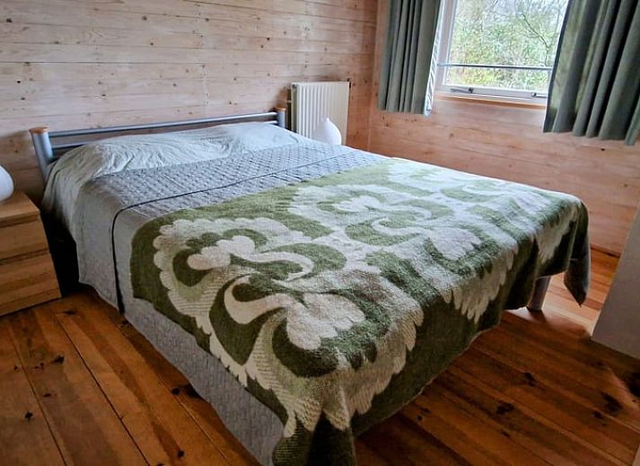 Blossom in full bloom at Cottage in Koekange, vacation home in southwest Drenthe, with veranda in the background.