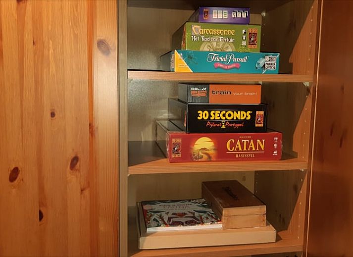 Cozy porch of Huisje in Koekange, cottage in Southwest Drenthe, with tea and garden views.