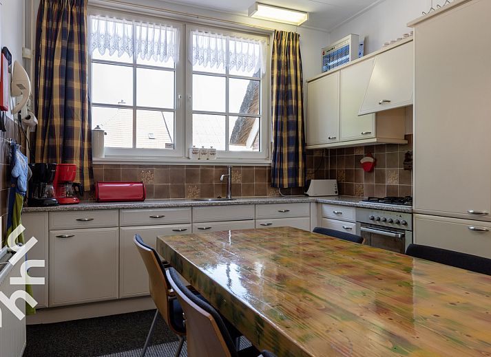 Gemuetliches Wohnzimmer im Ferienhaus DG407, Uffelte, Suedwest-Drenthe, mit komfortabler Sitzecke.