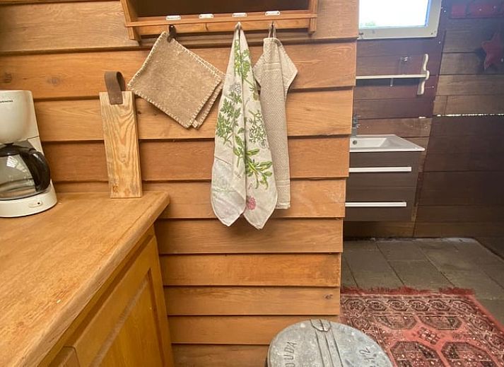 Uitzicht op groene velden vanuit de tuin van Vakantiehuisje in Elim, Zuidwest Drenthe.