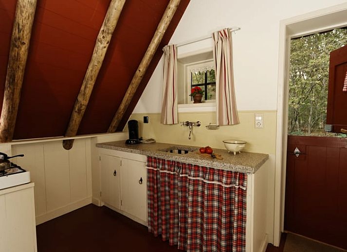 Gemuetliches Esszimmer im Ferienhaus in Ansen, Suedwest-Drenthe, mit laendlichem Ambiente.