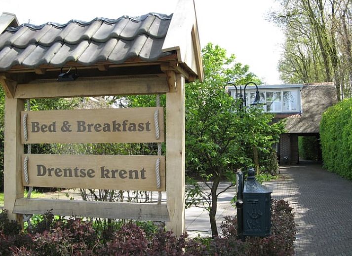 Sfeervolle slaapkamer in Huisje in Veeningen, vakantieaccommodatie in Drenthe.