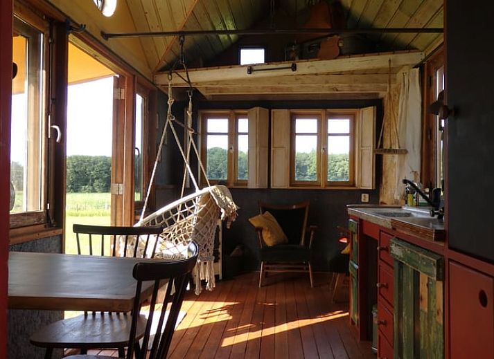 Enjoy the peace and quiet on the terrace of Huisje in Veenhuizen, located in Frederiksoord, Southwest Drenthe.