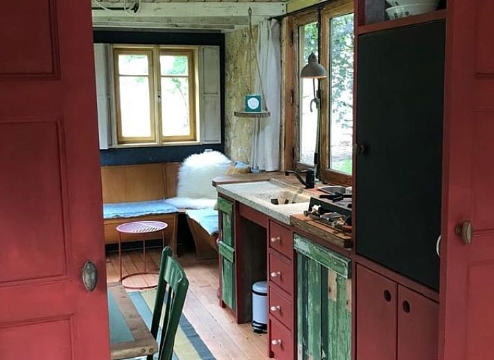 Enjoy the peace and quiet on the terrace of Huisje in Veenhuizen, located in Frederiksoord, Southwest Drenthe.