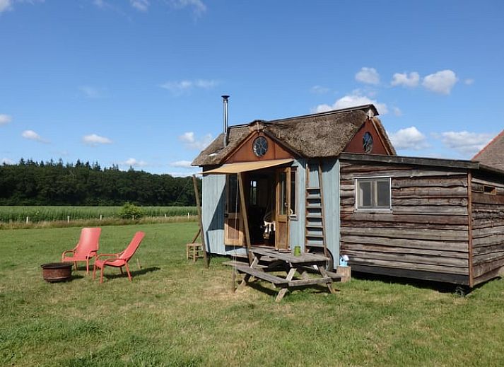 Cozy indoor area of Huisje in Veenhuizen overlooking nature in Frederiksoord, Drenthe.