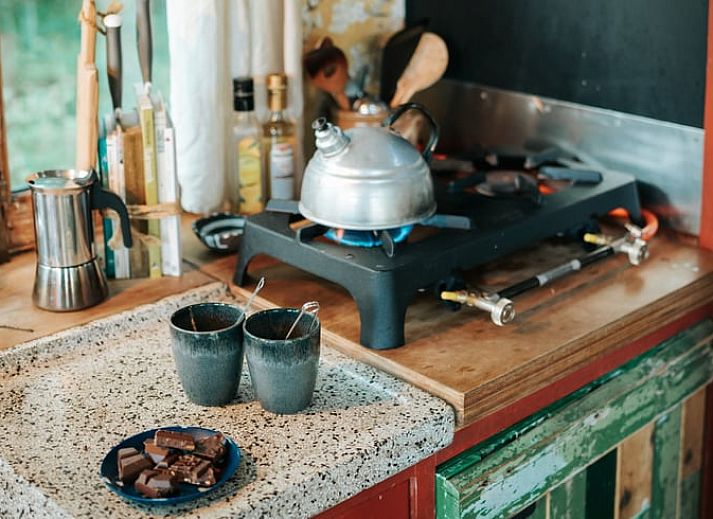 Cozy indoor area of Huisje in Veenhuizen overlooking nature in Frederiksoord, Drenthe.