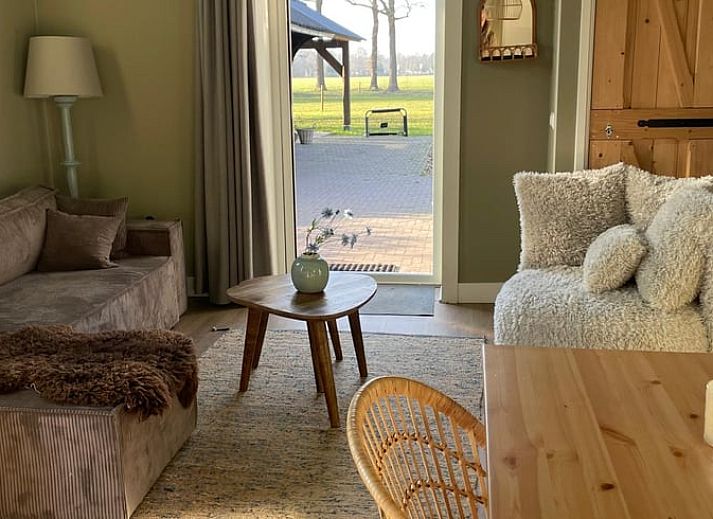 Buitenkant van Vakantiehuis in Frederiksoord, Zuidwest Drenthe, met landelijke omgeving en traditionele architectuur.