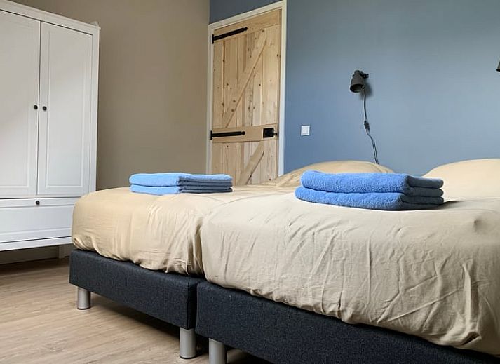 Buitenkant van Vakantiehuis in Frederiksoord, Zuidwest Drenthe, met landelijke omgeving en traditionele architectuur.