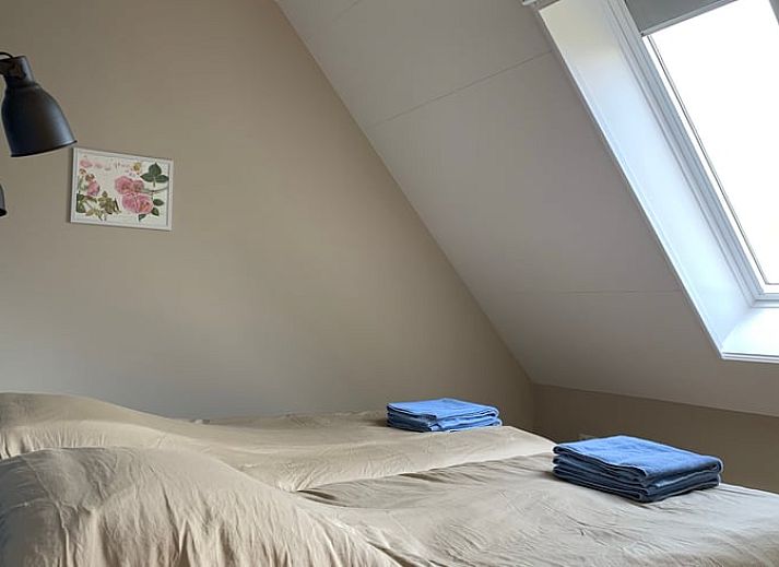 Buitenkant van Vakantiehuis in Frederiksoord, Zuidwest Drenthe, met landelijke omgeving en traditionele architectuur.