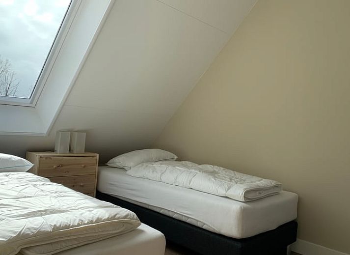 Buitenkant van Vakantiehuis in Frederiksoord, Zuidwest Drenthe, met landelijke omgeving en traditionele architectuur.