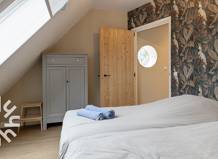 DG1027 vacation home in Frederiksoord, Drenthe with sunny terrace and green surroundings.