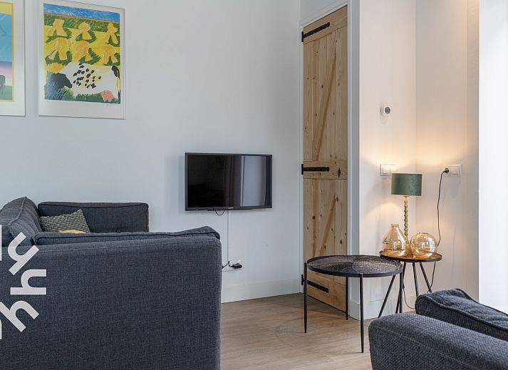 DG1027 vacation home in Frederiksoord, Drenthe with sunny terrace and green surroundings.