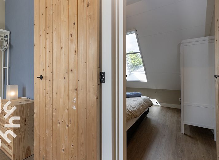 Vrijlopende kippen bij vakantiehuis DG1030 in Frederiksoord, Drenthe, omgeven door natuur.