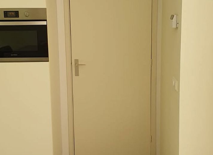 Covered sitting area at Holiday Home in Oude Willem, ideal for relaxation in Drenthe.