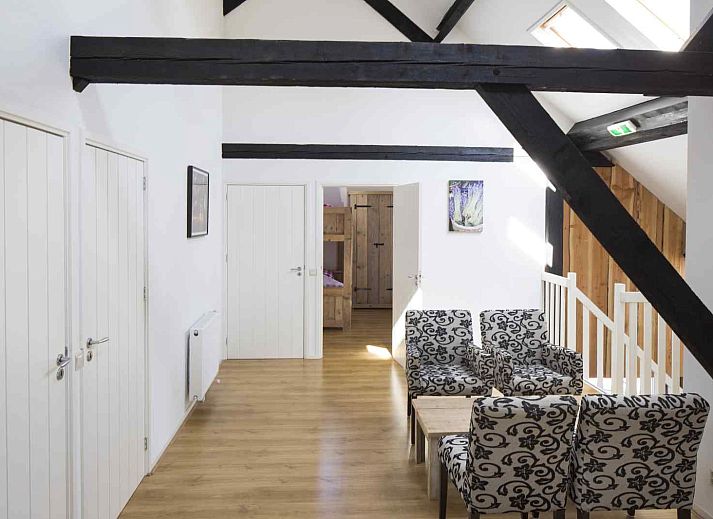 Buitenkant van DG1556 vakantiehuis in Oude Willem, Zuidwest Drenthe met charmante bakstenen gevel.