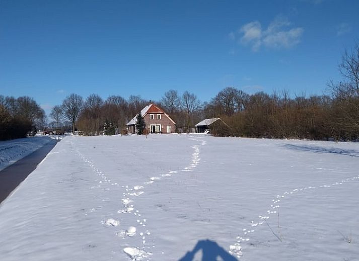 Gemuetliches Wohnzimmer des modern eingerichteten Ferienhauses in Hollandscheveld in Drenthe.