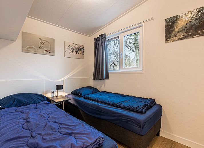 Veranda des freistehenden Hauses in Biddinghuizen mit Blick auf den grnen Garten in Ost-Flevoland, ideales Ferienhaus fr Naturliebhaber.