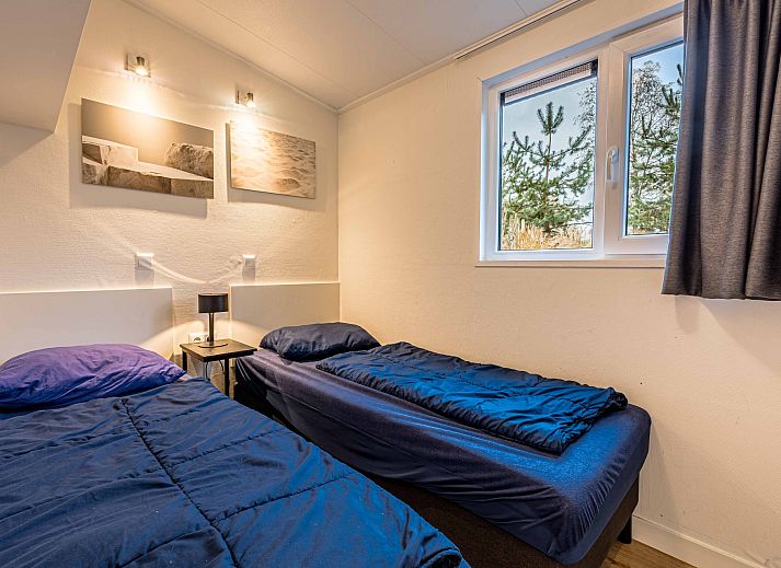 Veranda des freistehenden Hauses in Biddinghuizen mit Blick auf den grnen Garten in Ost-Flevoland, ideales Ferienhaus fr Naturliebhaber.