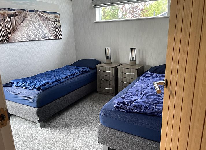 Stijlvolle woonkamer in Vrijstaande woning in Biddinghuizen, Oostelijk Flevoland met moderne keuken en comfortabele zithoek.