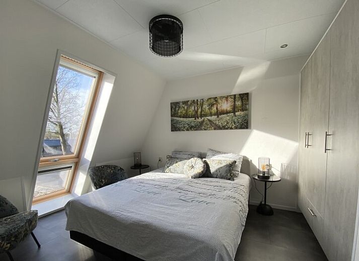 Spacious living room of detached house in Biddinghuizen, overlooking the green landscape in Eastern Flevoland, Flevoland.