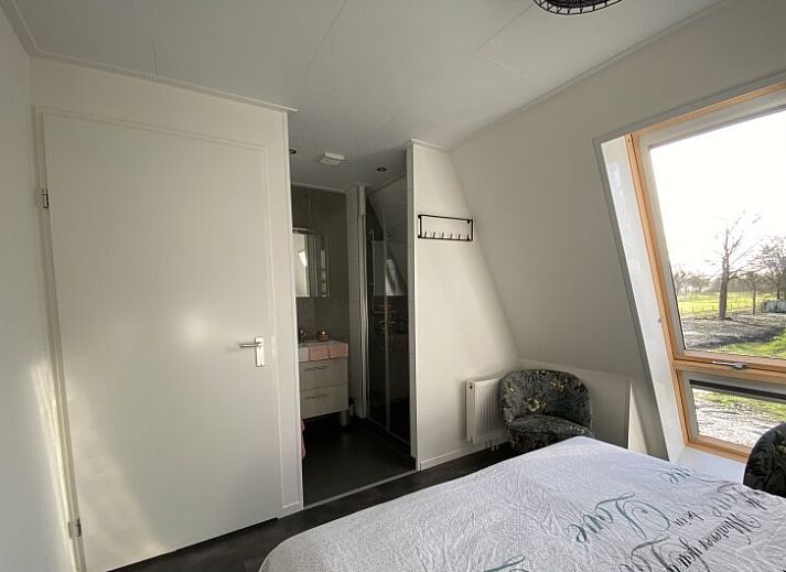 Spacious living room of detached house in Biddinghuizen, overlooking the green landscape in Eastern Flevoland, Flevoland.