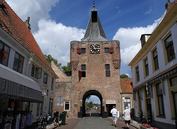 Spacious dining room in Safari Tent Wood, Biddinghuizen, ideal for a cozy meal in Flevoland.