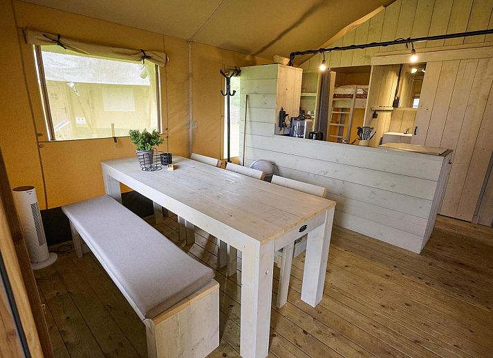 Spacious veranda of Safari Cottage, vacation home in Biddinghuizen, ideal for relaxation in Eastern Flevoland.