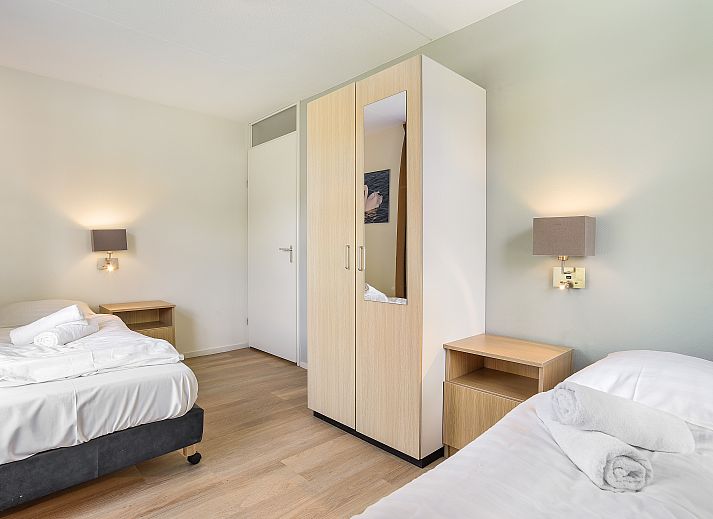 Floor plan of the Waterparc Veluwemeer 16-person villa in Biddinghuizen, Flevoland, featuring spacious bedrooms and modern bathrooms.