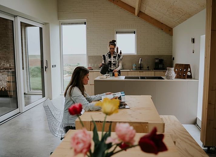 Geniessen Sie den Sonnenuntergang im Ferienhaus in Kraggenburg, einem charmanten Ferienhaus in Ost-Flevoland, Flevoland.