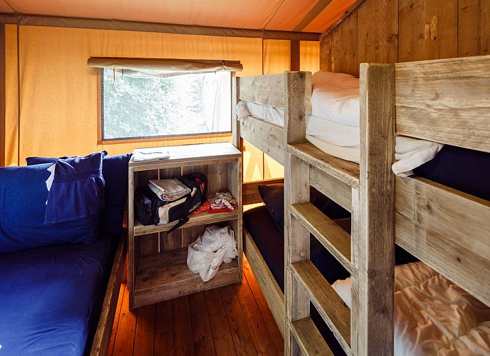 Families enjoy on the terrace of Safari Tent Woody in Zeewolde, Southern Flevoland.