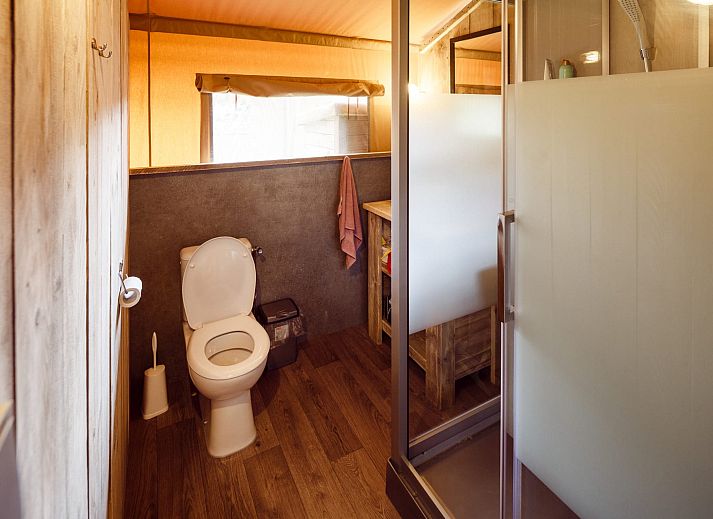 Families enjoy on the terrace of Safari Tent Woody in Zeewolde, Southern Flevoland.