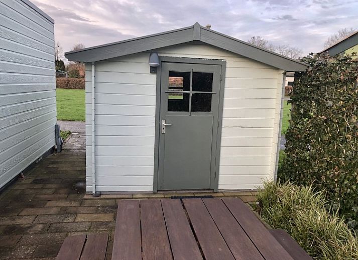 Terrace of A76 vacation home in Zeewolde, Southern Flevoland with comfortable sunbeds and seating area.