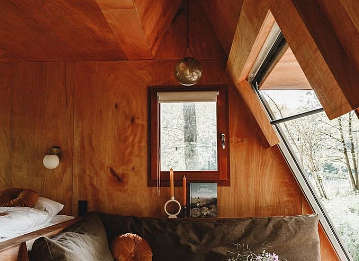 Vakantiehuis in Zeewolde, Zuidelijk Flevoland gelegen in een bosrijke omgeving met houten veranda.