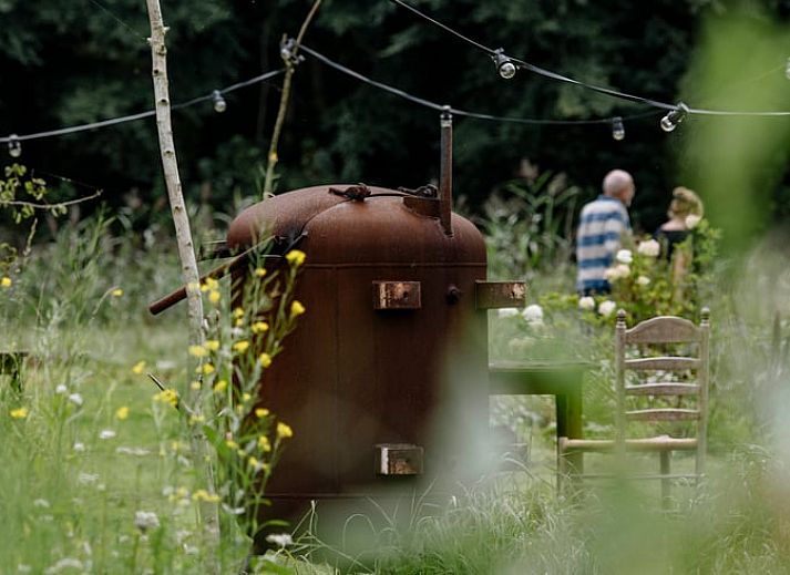 Cozy indoor area of Holiday Home in Zeewolde, Southern Flevoland, with wooden interior and comfortable seating area.