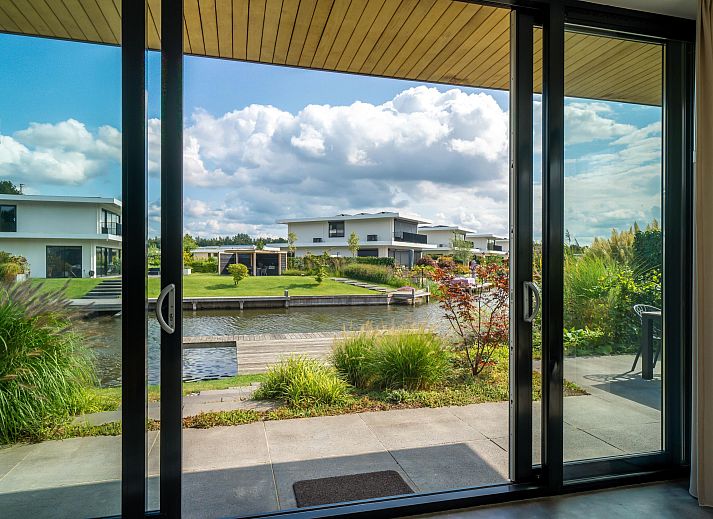Freistehendes Haus in Zeewolde, umgeben von einem ppigen Garten und einem Teich, Ferienhaus in Sd-Flevoland mit einer ruhigen natrlichen Umgebung.