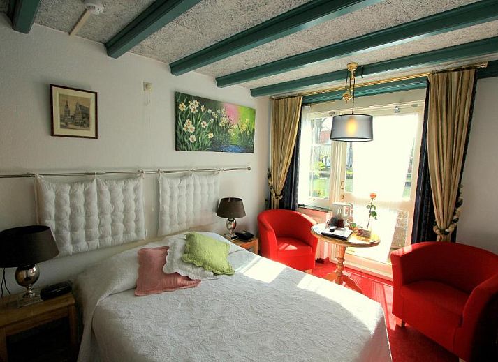 Geraeumiges Familienzimmer im Hotel & Restaurant De Fortuna, ideal fuer einen Aufenthalt in Edam.