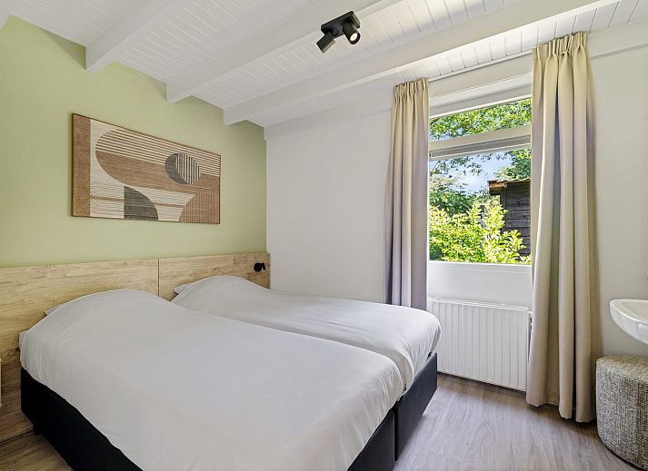 Bungalow het Roodborstje in Appelscha mit sonnigem Garten und Terrasse in den friesischen Waeldern, Friesland.