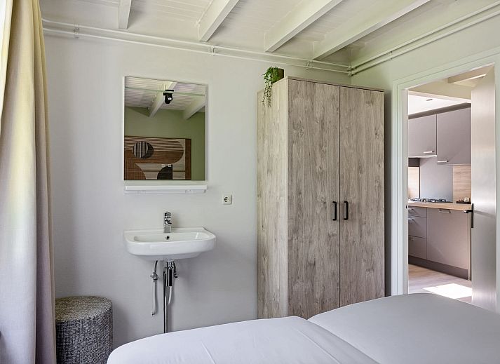 Gemuetliches Wohnzimmer von Bungalow het Roodborstje in Appelscha, Ferienhaus in den friesischen Waeldern.