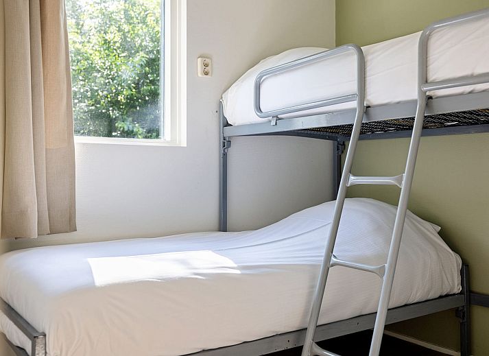 Gemuetliches Wohnzimmer von Bungalow het Roodborstje in Appelscha, Ferienhaus in den friesischen Waeldern.