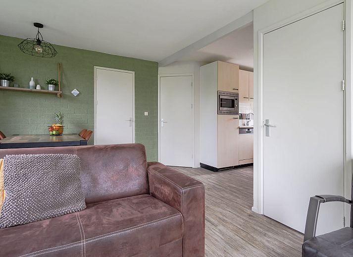 Bungalow het Beekdal in Appelscha bietet einen ruhigen Aussenbereich mit einer Terrasse in den friesischen Waeldern.