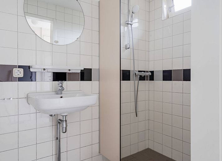 Gemuetliches Wohnzimmer von Bungalow het Beekdal in Appelscha mit Blick auf die friesische Landschaft.