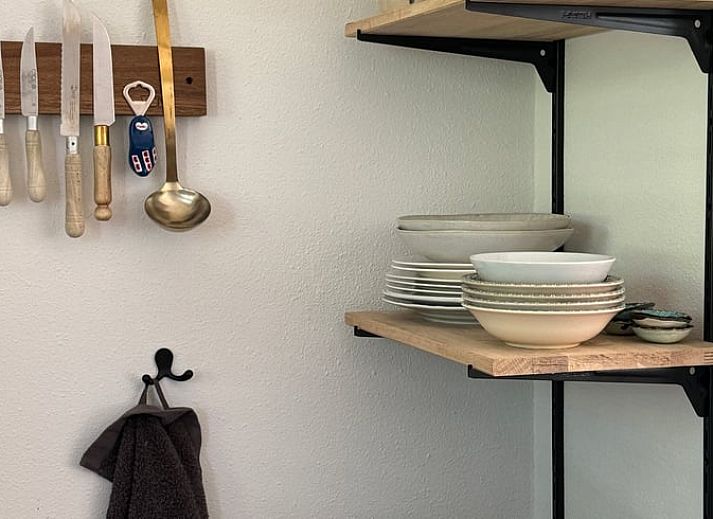 Kraeutergarten im Ferienhaus in Sondel, umgeben von friesischen Waeldern in Friesland.