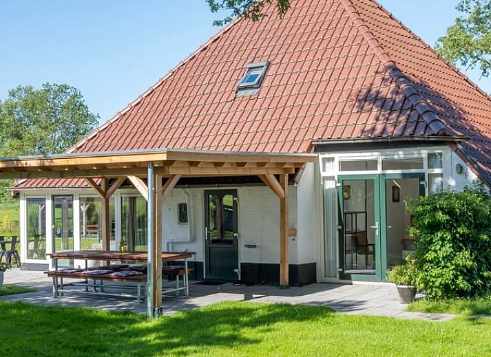 Aerial view of Holiday home in Haule, surrounded by lush nature in Friesland.